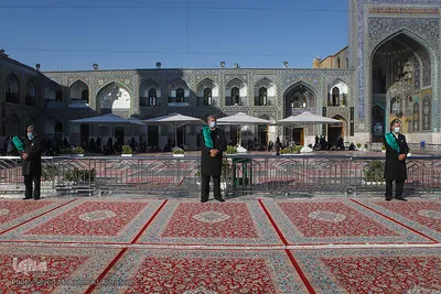 تعویض پرچم گنبد حرم رضوی در آغاز ماه محرم