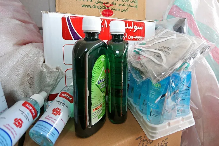 کشف انبار الکل و دستکش احتکار شده در کرمانشاه
