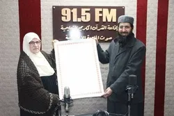 60-Year-Old Palestinian Woman Receives Quran Recitation License