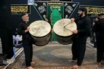 ⁨دسته‌ی عزاداری «مشق شمشیر» در قم⁩