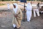 مراسم غسل تعمید منداییان در کنار رودخانه کارون