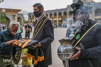 آیین تعویض پرچم گنبد آستان حضرت شاهچراغ (ع)‎‎
