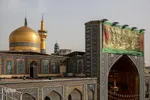 آیین تعویض پرچم گنبد حرم امام رضا(ع)
