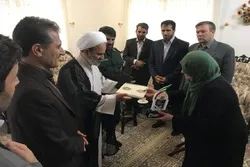 تجلیل از خانواده شهید ماموستا برهان عالی در کردستان