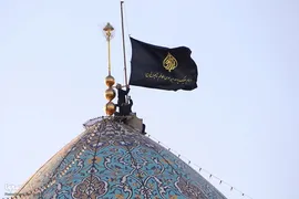 آیین تعویض پرچم گنبد حرم مطهر حضرت شاهچراغ (ع)