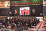 اهتزاز پرچم عاشورایی نوجوانان بوشهری در همایش «احلی من‌العسل»