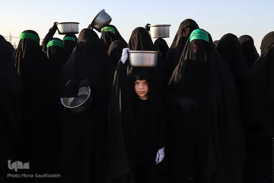 مراسم نمادین خاکسپاری شهدای کربلا در حمیدیه