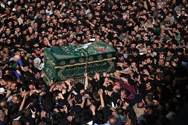 بالصور...مراسم التشييع الرمزي لنعش الإمام الكاظم (ع) في العراق