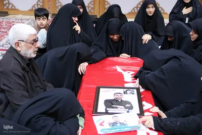 وداع با ۱۲ شهید جنگ رمضان استان فارس در حرم شاهچراغ(ع)