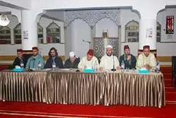 बेल्जियम में कुरान के साथ उंस समारोह के चित्र