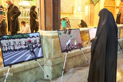 برپایی نمایشگاه عکس به مناسبت هفته دفاع مقدس در حرم مطهر شاهچراغ(ع)