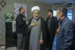حضور آیت‌الله دژکام در منزل شهید معصومه کرباسی‎