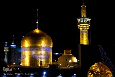 تعویض پرچم گنبد حرم امام رضا(ع)‎