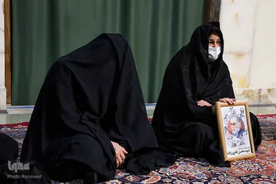 مراسم وداع با پیکر شهید محسن فخری‌زاده در حرم مطهر رضوی
