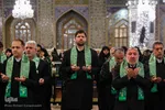 آیین تعویض پرچم گنبد حرم امام رضا(ع)
