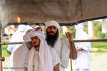 مراسم غسل تعمید منداییان در کنار رودخانه کارون