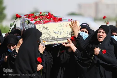 تشییع پیکرهای پاک و مطهر دو شهید گمنام دوران دفاع مقدس در مجتمع فرهنگی ورزشی فجر سپاه اهواز
