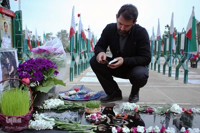 آغاز سال جدید در جوار شهدا
