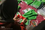 آماده‌سازی لباس همایش جهانی شیرخوارگان حسینی