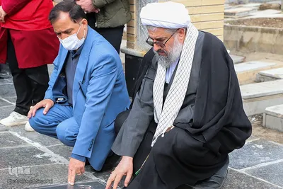 غبارروبی گلزار شهدای ملایر هم‌زمان با روز بزرگداشت شهدا