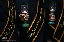 آیین سنتی شمع گردانی در حرم حضرت معصومه(س)