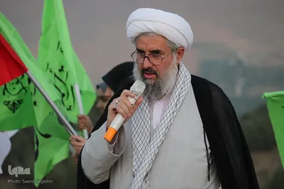 مراسم اهتزاز پرچم مزین به نام امیر المومنین علیه السلام در ملایر