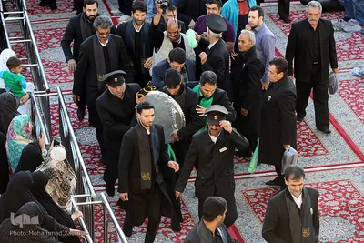 آئین تعویض پرچم گنبد مطهر رضوی در آستانه ماه محرم
