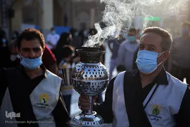 مراسم برافراشته شدن پرچم عزای حسینی بر گنبد آستان مقدس حضرت عبدالعظیم حسنی(ع) در شهر ری