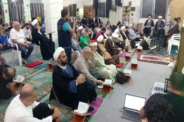 بالصور.. أمسية قرآنية بمشاركة قارئ مصري دولي بمدينة 