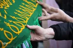 تعويض پرچم گنبد امامزاده علي بن جعفر(ع)