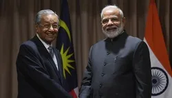 করোনায় জোড়া লাগছে মোদি-মাহাথির সম্পর্ক