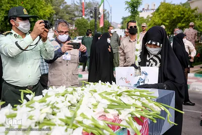 استقبال از پیکر شهید «نسیم افغانی» در فرودگاه شهید هاشمی نژاد مشهد