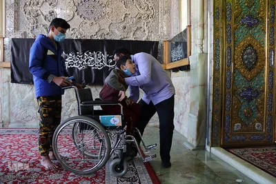 آیین تعویض پرچم گنبد آستان مقدس احمدی و محمدی شاهچراغ(ع)‎‎
