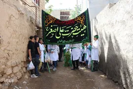 مراسم چغچغه‌زنی روز تاسوعای حسینی در روستای انجدان