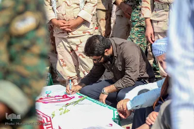 مراسم استقبال از پیکرهای 44 شهید تازه تفحص شده دوران دفاع مقدس در مرز بین المللی شلمچه برگزار شد