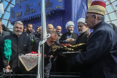 آیین اهتزاز پنج پرچم حرمین عتبات عالیات در برج میلاد تهران
