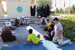 غبار روبی گلزارشهداء همزمان باآغاز هفته دفاع مقدس در ملایر‎