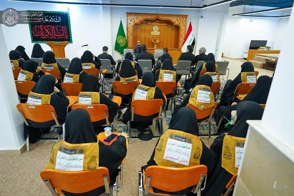 العتبة العلوية تستقبل وفداً من حافظات القرآن من إیران + صور