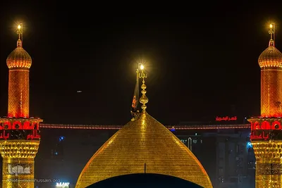 برافراشتن قرآن کریم همزمان با تعویض پرچم گنبد امام حسین(ع)