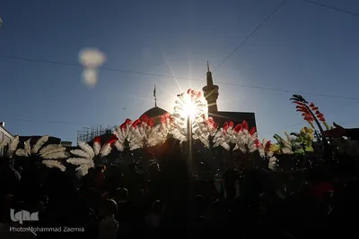 آئین تعویض پرچم گنبد مطهر رضوی در آستانه ماه محرم