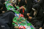 آماده‌سازی لباس همایش جهانی شیرخوارگان حسینی