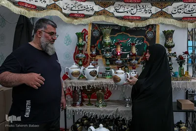نمایشگاه «عطر سیب» در میدان آئینی امام حسین(ع)