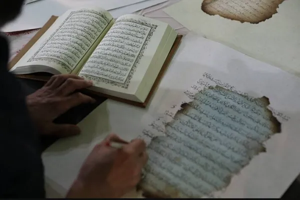 Iranian Calligrapher Spends Months Restoring Damaged Quran