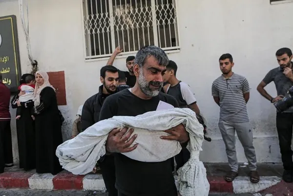 Death Toll in Gaza Hits 1,900 as Israeli Regime Targets Convoys of Fleeing Civilians 