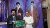 تجلیل از دبیر جامعه  قرآنی لرستان در گردهمایی مسئولان جوامع قرآنی عصر