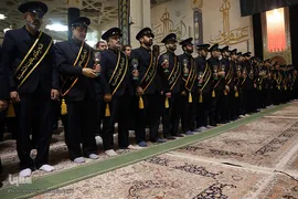 آیین سنتی شمع گردانی در حرم حضرت معصومه(س)