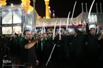 ⁨دسته‌ی عزاداری «مشق شمشیر» در قم⁩
