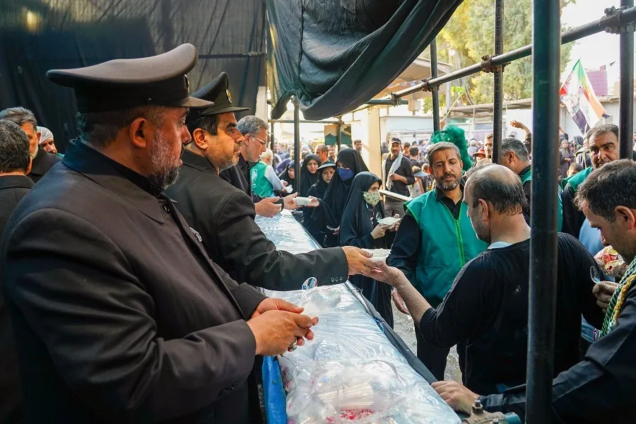 Imam Reza Shrine Moukebs Offering 10,000 Food Packages to Arbaeen Pilgrims Every Day