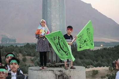 مراسم اهتزاز پرچم مزین به نام امیر المومنین علیه السلام در ملایر