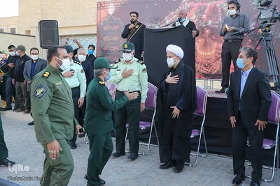 اهتزاز پرچم عزای اربعین در بین الحرمین شیراز